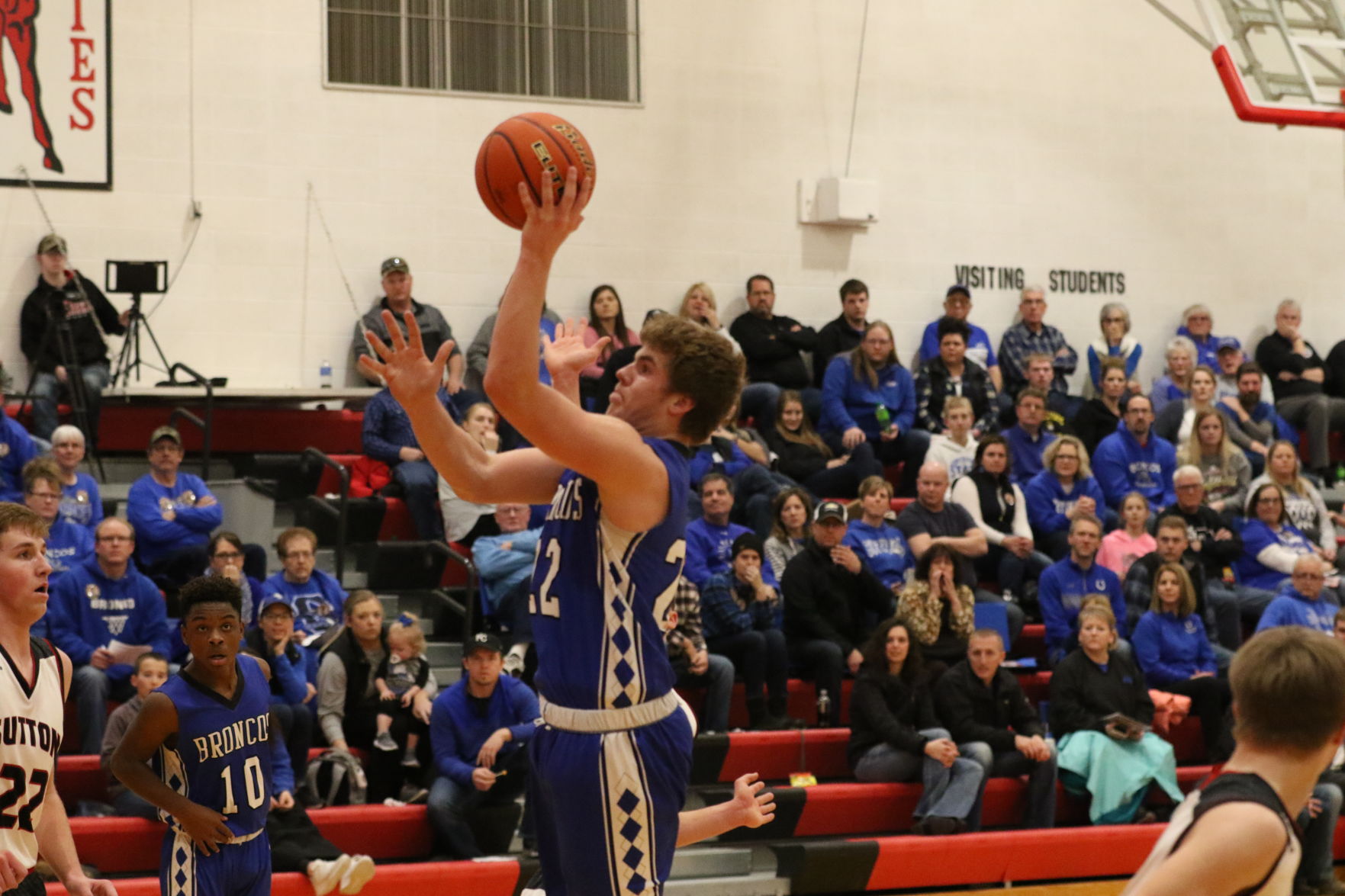 Centennial boys basketball at Sutton 15.JPG